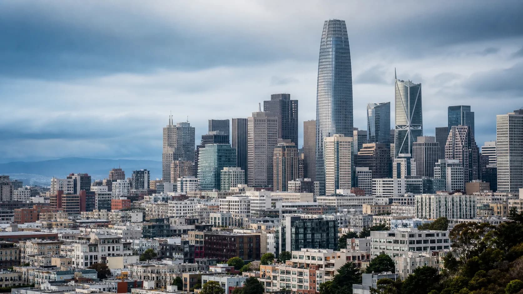 Daylight view of the San Francisco Financial District with Salesforce Tower above the city skyline.